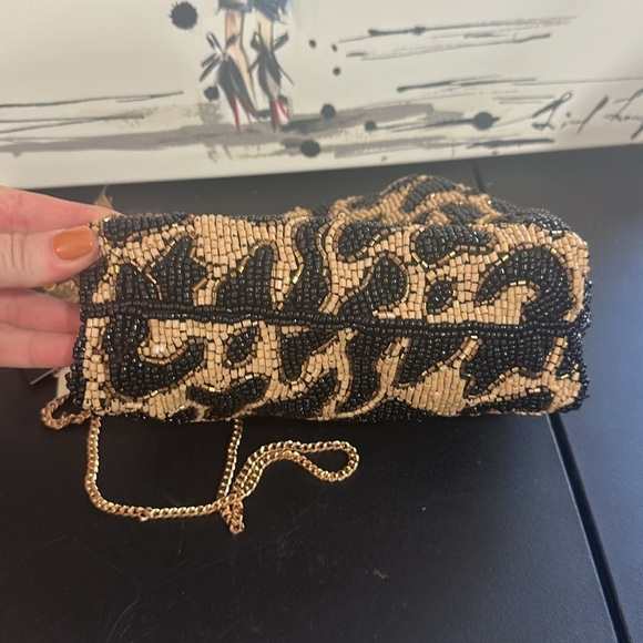 From India to you cheetah beaded clutch and gold crossbody chain bag